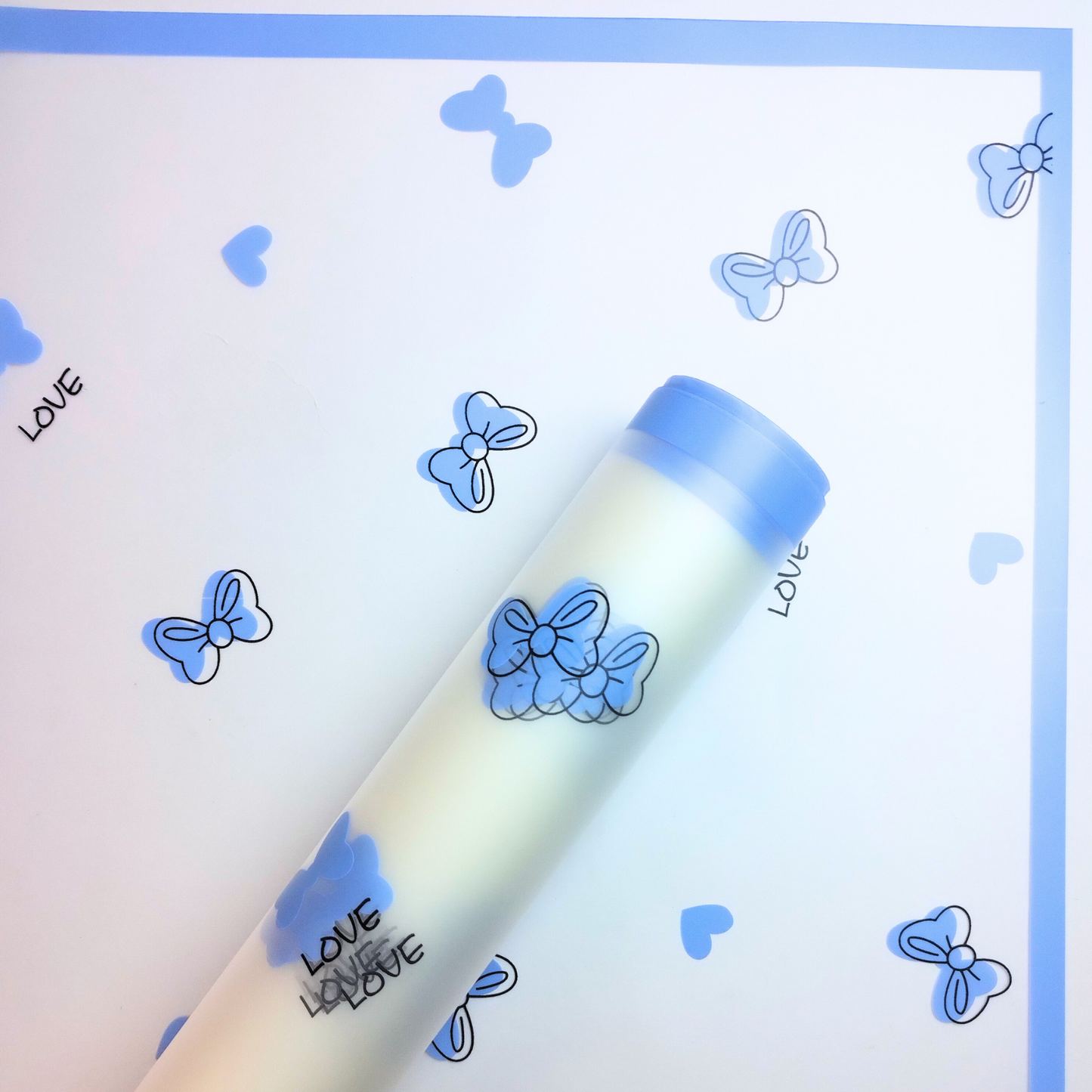 Papel coreano moñitos love fondo transparente x 20